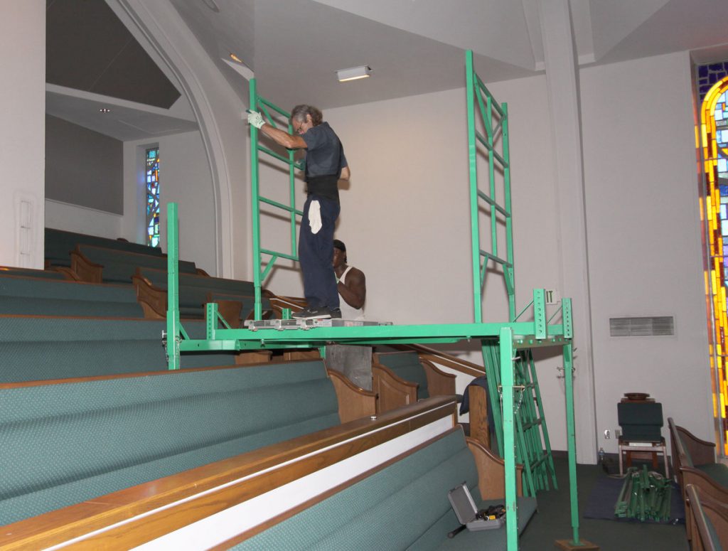 Scaffolding for uneven floors in churches